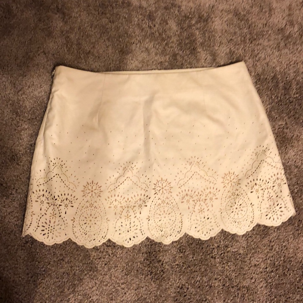 White vegetarian leather and lace mini skirt
